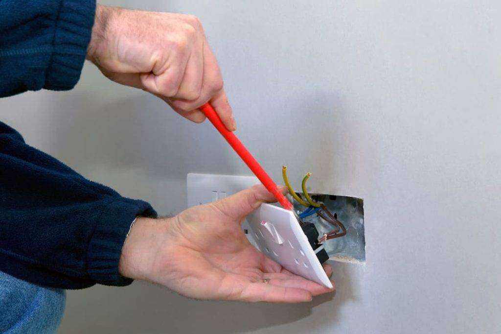 Electrician Wiring A White Double Socket