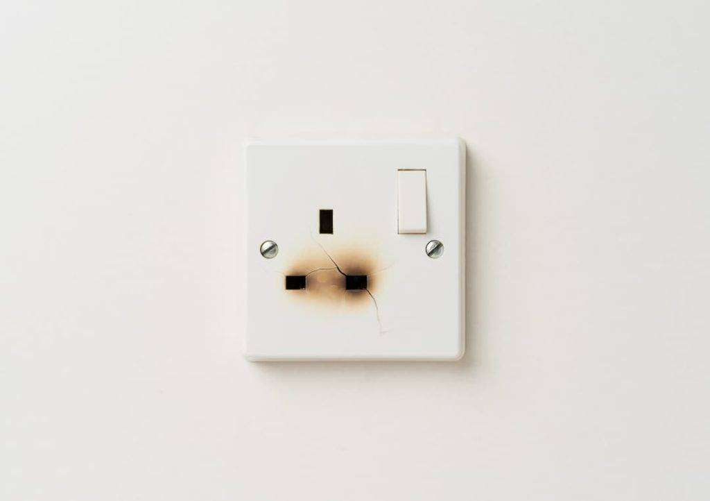 Burnt Three-Pin Socket